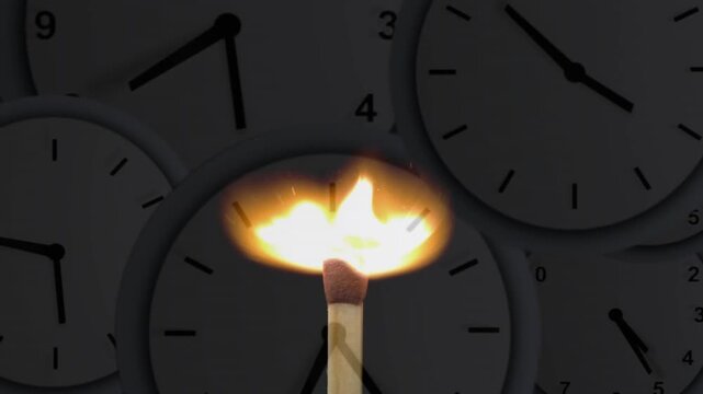Wooden match sparking, burning and shaping into flame wings sweeping dim clock faces, showing time