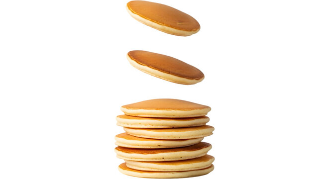 Stack of delicious golden brown pancakes falling against on transparent background