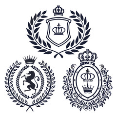 Obraz premium Three distinct crests with intricate designs and symbols