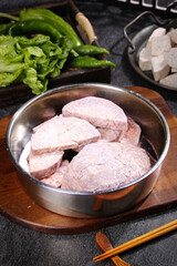 Fototapeta premium Fresh Peeled Taro Root Pieces in Cooking Pot with Vegetables