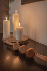 Minimal Spa Arrangement With Candles And Wooden Tools