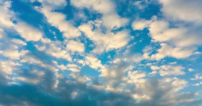 Blue Sky with White Clouds and Sunlight