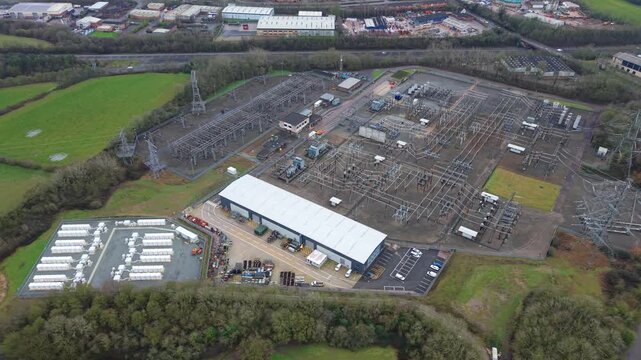 Aerial view of critical energy infrastructure and electrical power management systems for the Great Grid Upgrade and grid overload protection.