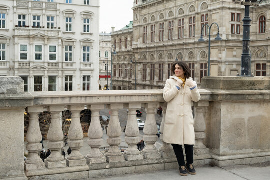 Tourist enjoying city view at Albertina terrace in Vienna