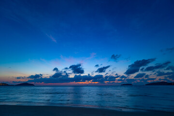 Landscape view of majestic clouds in the sky sunset or sunrise over sea with reflection in the tropical sea,Beautiful cloudscape scenery,Amazing light of nature Landscape nature background