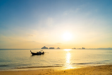 Aerial view sunset sky,Nature beautiful Light Sunset or sunrise over sea,Colorful scenery sunset Panorama Sky with Amazing clouds and waves in the ocean golden light cloud background