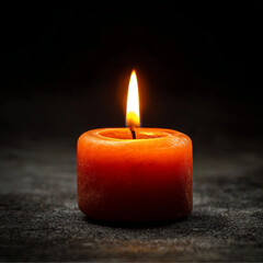 orange tiny Candle shining very small in a black Environment