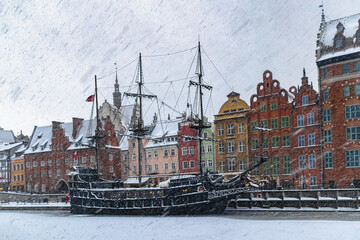Beautiful ancient sail ship moored on the embankment of frozen Motlawa river in Gdansk