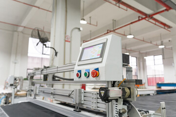 Close-up of control panel for automated equipment in factory workshop © zhu difeng