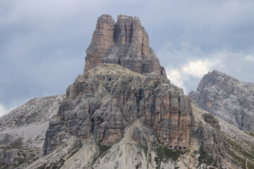Obraz premium Close‑up of Sasso di Sesto peak shrouded in dramatic dark clouds in the Dolomites