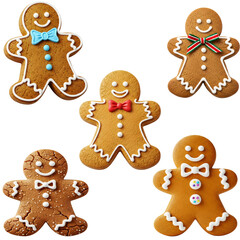 Fototapeta premium Assorted decorated gingerbread men cookies arranged together on a festive holiday display - cut-out isolated