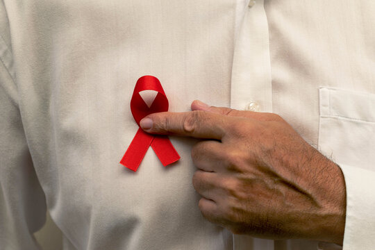 Red ribbon, red May. Awareness campaign on the prevention of oral cancer.