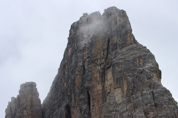 Fototapeta premium Rugged Dolomites massif, close‑up aerial view of towering mountain cliffs