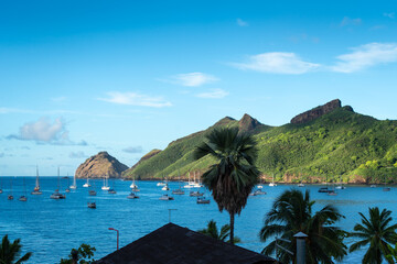 Taiohae Bay with anchored sailboats in Nuku Hiva, Marquesas Islands, French Polynesia