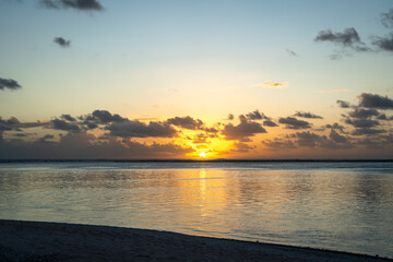 Golden sunset over the ocean in Tikehau, French Polynesia