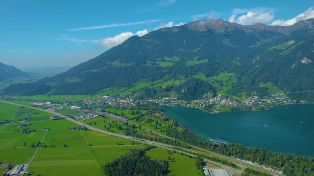 Aerial view of city Weesen beside the lake walensee in Switzerland on a sunny day in summer.