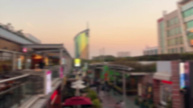 Blurred Background View of DLF CyberHub in Gurgaon, India Showing Urban Lifestyle and Business District