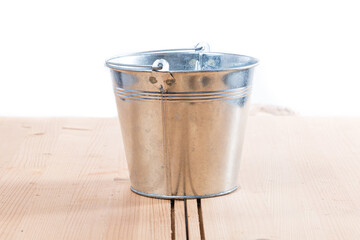 gray metal bucket on a white background