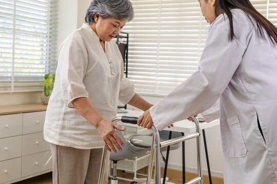 Senior healthcare support, Clinic, nurse, elderly, doctor and caregiver guide safe standing and walking with walker, balance assessment, fall risk management, recovery progress, follow up monitoring