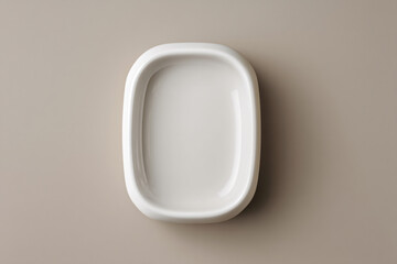 Ceramic soap dish on neutral background with copy space for bathroom product branding