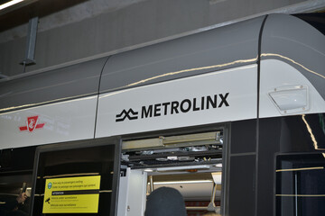 Fototapeta premium Line 5 Flexity Freedom train with Metrolinx and TTC icons, Toronto (8-feb-2026)