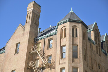 Fototapeta premium detail of historic property known as Stewart Building, designed by EJ Lennox, 1894, 149 College St, Toronto