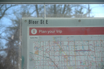 Fototapeta premium Toronto Transit Commission ride-guide surface route map inside a bus shelter on Bloor St E