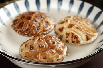 Changbaishan Mushroom Dumplings on Plate - Traditional Northeast Chinese Cuisine