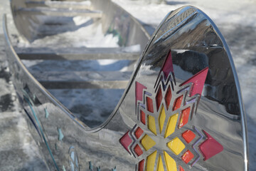 Fototapeta premium detail of Spirit Canoe, designed by Tannis Nielsen, at Spirit Garden at Nathan Phillips Square, City Hall, Toronto