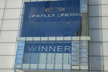 Fototapeta premium Cineplex Cinemas and Winners sign at Yonge Eglinton Centre, a shopping mall, located at 2300 Yonge St, Toronto