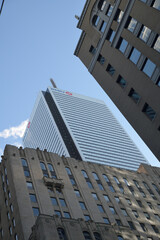 Fototapeta premium contrast of historic and modern office towers in Toronto Financial District