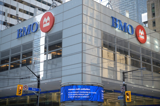 BMO, Bank of Montreal corporate logo and digital ring billboard, outside First Canadian Place, King & Bay, Toronto