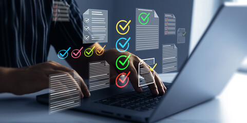 Check digital documents on laptop with checklist approval icon, verification, workflow control, productivity and online document management	
