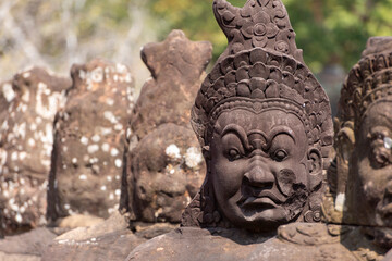 Angkor Thom, Siem Reap, Cambodia.  The bridge at the South gate with statues of the Asuras