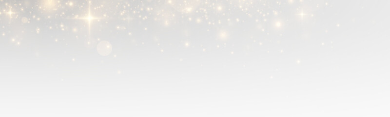Sparkling bokeh with glowing stardust and magical particles, golden flare and shiny confetti across a bright abstract christmas background.