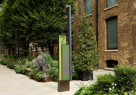 Real photo of House sign number Display in a London Garden Area. PSD template Mockup.
