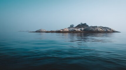 Misty Island Landscape with Calm Ocean Waters.