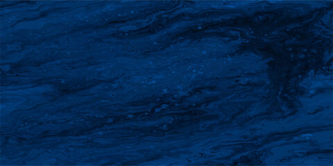 Abstract blue water background of a clear ocean surface with ripple texture and liquid waves reflecting a summer nature pattern