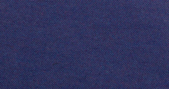 Stop-motion video of blue ink dot print on paper, showing dense halftone texture and subtle grain. Abstract printed background for design, retro, editorial, and tech visuals.