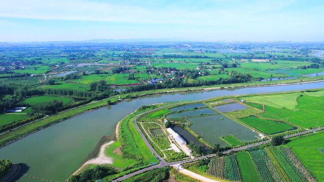 Aerial European Farmland with Irrigation Canals and River