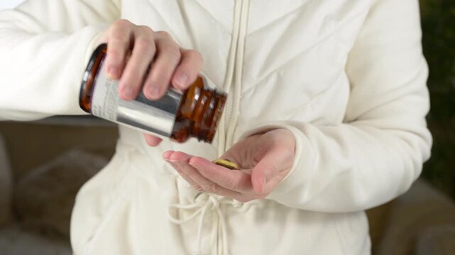 Pouring Tablets or Pills Supplement from Glass Bottle with Sound