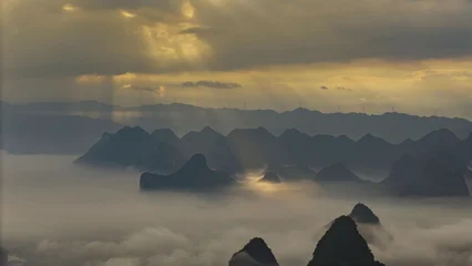 Keuken achterwand Guilin Guilin Mountains with Mist and Golden Sky at Sunrise  © Ngo