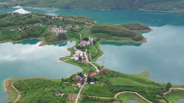 Aerial shot of lake village shoreline