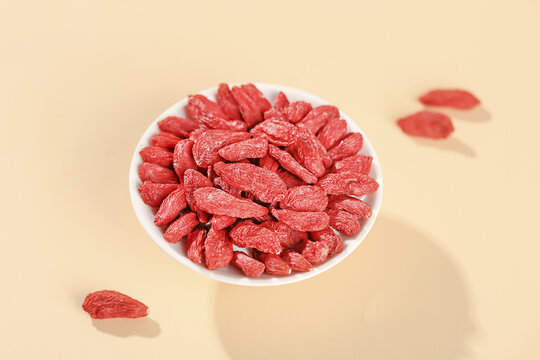 Dried Red Goji Berries from Ningxia in White Bowl - Healthy Superfood Supplement Still Life