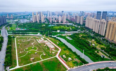 Wuhan Huangxiao Ecological Corridor Aerial View with River and City Skyline © TranPhuoc