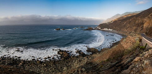 Fototapeta premium Tenerife, Canary Islands, Spain: aerial and panoramic view of the northwestern coast of the island, with the spectacular and wild beaches in the protected area of the Anaga Rural Park 