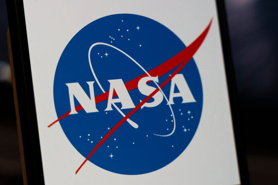 Warsaw, Poland - Feb 10, 2026: NASA logo featuring a blue circle with red swoosh and white lettering, symbolizing space exploration and innovation.