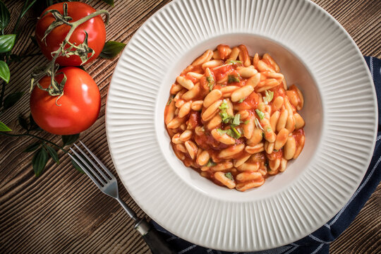 Cavatelli pasta with fresh tomato sauce.