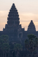 Angkor Wat, Cambodia, Sunrise behind the iconic Angkor Wat temple. Some misty detail