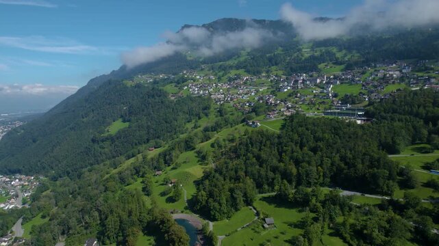An  aerial panorama view of the old town city Triesenberg in Liechtenstein on a sunny noon in summer